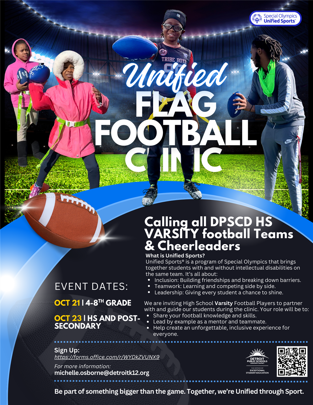 Students on a field holding footballs